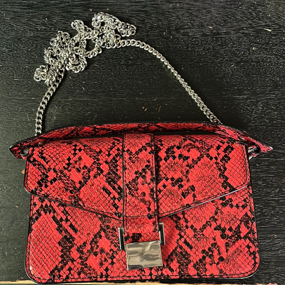 Red snake skin bag